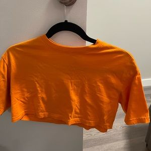 Orange crop top size XS